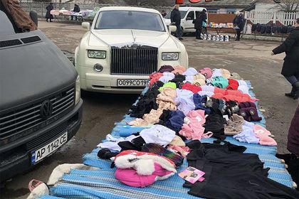 <br />
Украинка на Rolls-Royce продавала картошку на рынке<br />
